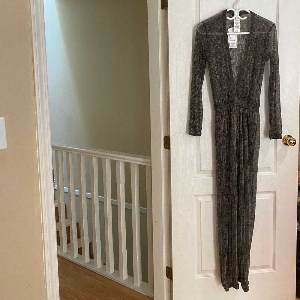 Kiki riki NEVER WORN long sleeved jumpsuit